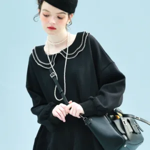 فستان بياقة دمية سوداء كبيرة الحجم مع جيوب - طراز عتيق للارتداء اليومي غير الرسمي فريد وأنيق 255233